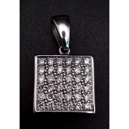 1090 - An 18K white gold pendant with diamonds (0.5 carats appr.). Height: 18 mm, weight: 2.97 g.