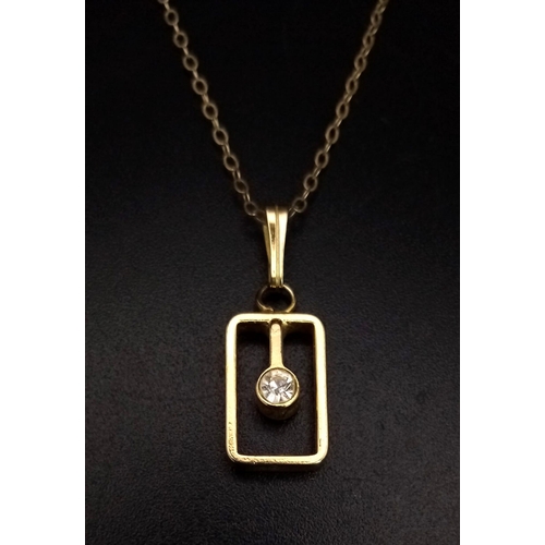 589 - A 9K Yellow Gold White Stone Pendant on a 9K Yellow Gold Necklace. 2cm and 38cm. 1.62g total weight.