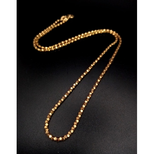 646 - A 9K Yellow Gold Reptilian-Skin-Link Necklace. 42cm. 3g