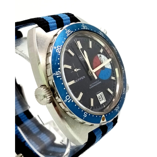 113 - A HEUER SKIPPER gents watch. 42 mm case, blue bezel, dark blue face with white hands and hour marks.... 