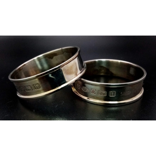 1229 - Two Carrs of Sheffield Sterling Silver Napkin Rings. Comes in a Carrs presentation case. 28g total w... 