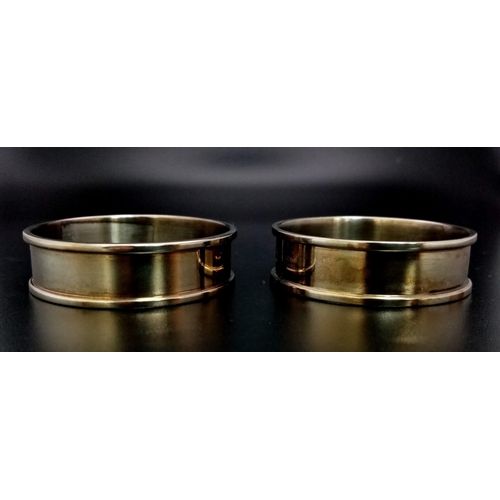 1229 - Two Carrs of Sheffield Sterling Silver Napkin Rings. Comes in a Carrs presentation case. 28g total w... 