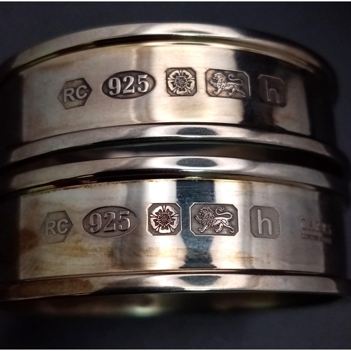 1229 - Two Carrs of Sheffield Sterling Silver Napkin Rings. Comes in a Carrs presentation case. 28g total w... 