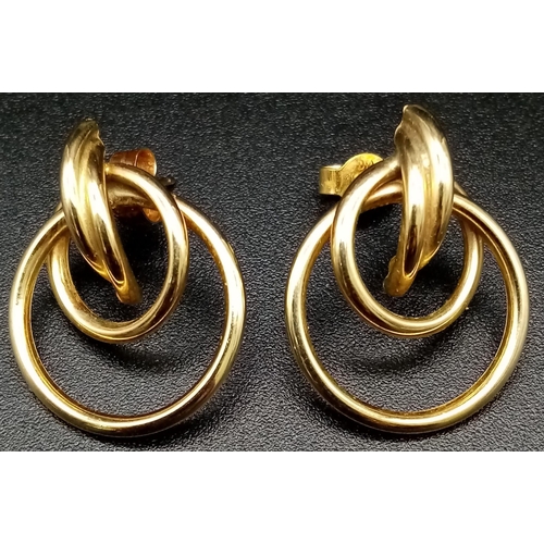 1304 - A Pair of 9K Yellow Gold Double Circle Earrings. 2.03 total weight.