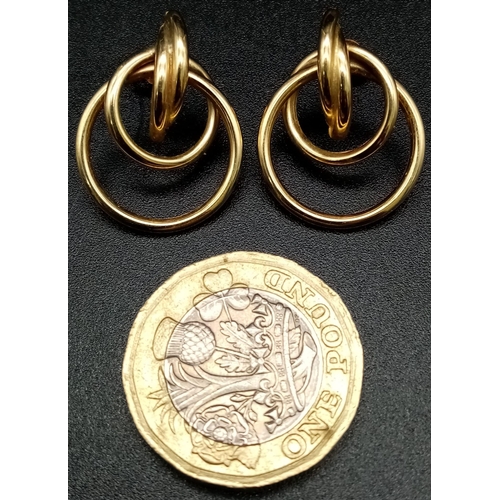 1304 - A Pair of 9K Yellow Gold Double Circle Earrings. 2.03 total weight.