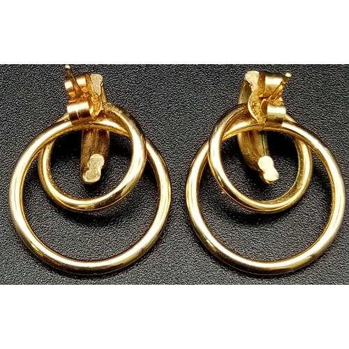 1304 - A Pair of 9K Yellow Gold Double Circle Earrings. 2.03 total weight.