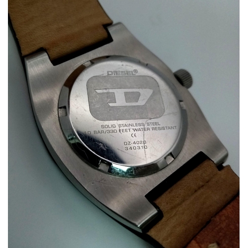 257 - A DIESEL stainless steel watch with its original leather strap. 34 mm case, multi-dial face, water r... 