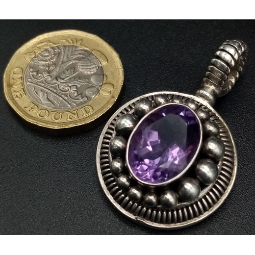 1329 - A 925 Silver Amethyst Ring and Pendant. Ring - Size L. Pendant - 4cm.