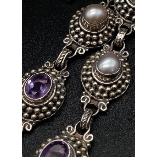 1338 - A Vintage Amethyst and Pearl Bracelet. Each piece sits in a nest of tiny balls. 22cm. 36.45g total w... 