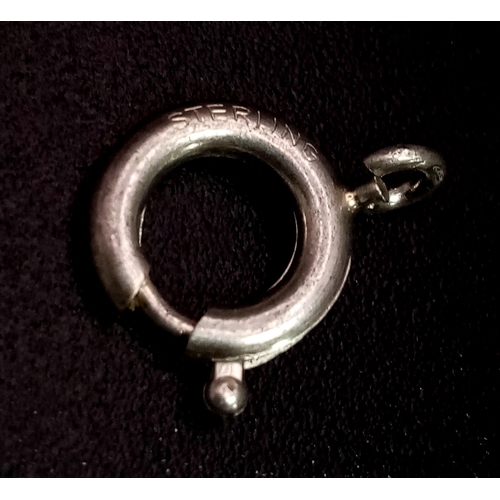 594 - A large group of silver hoop clasps. Total weight: 55 g.