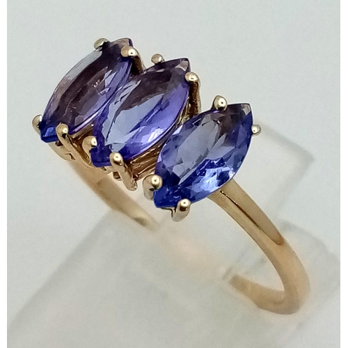 1051 - A Gorgeous 10K Yellow Gold Amethyst Trilogy Ring. Size S. 2.62g total weight. 3 clean oval amethysts... 