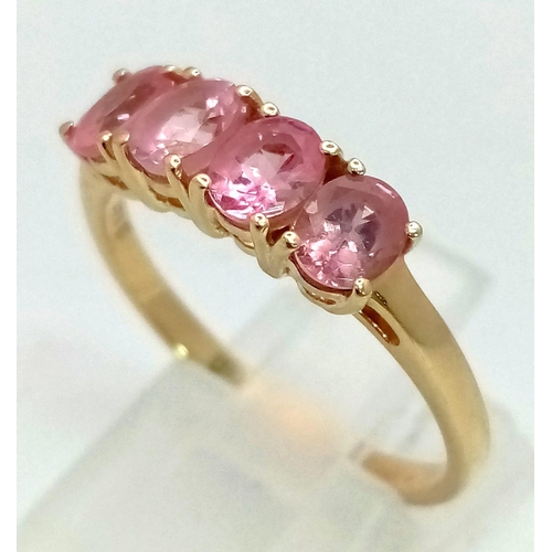 1053 - A 10K Yellow Gold Four Rose Quartz Gemstone Ring. Size R 1/2. 2.56g total weight.