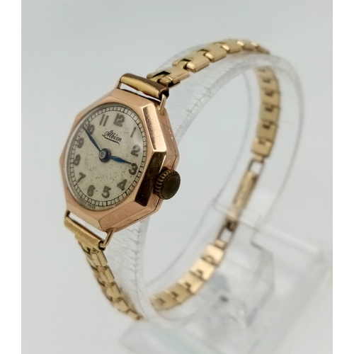 1202 - A Vintage 9K Yellow Gold Albion Ladies Watch. Rolled gold bracelet. 9K yellow gold case - 21mm. 14g ... 