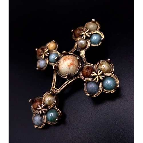 1246 - A Victorian Pinchbeck Gold Cross Brooch with Dropped Coloured Glass Decoration. 5 x 5.5cm.