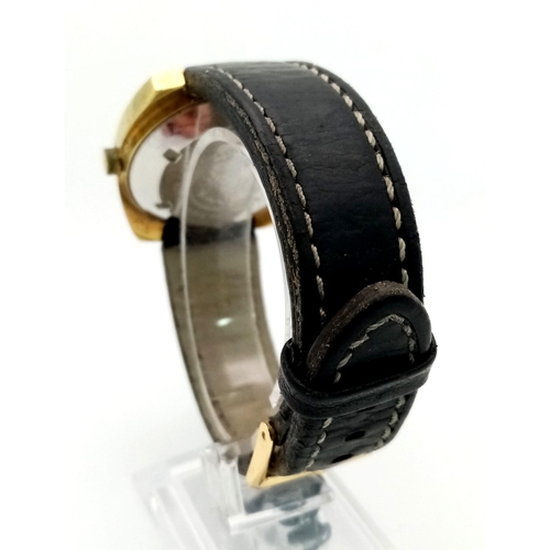 1264 - A Vintage Sicura 25 Jewel Gents Watch. Black leather strap. Two tone case - 37mm. Automatic movement... 