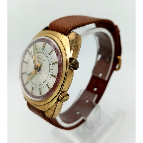 1268 - A Vintage USSR Sekonda Gents Watch. Brown leather strap. Two tone case - 34mm. 18 Jewels. In working... 