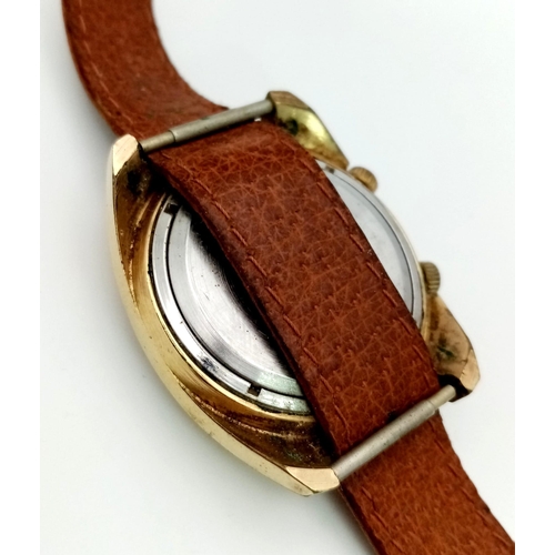 1268 - A Vintage USSR Sekonda Gents Watch. Brown leather strap. Two tone case - 34mm. 18 Jewels. In working... 