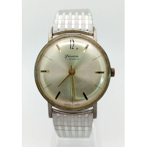 1292 - A Vintage Sicura 17 Jewel Gents Watch. Expandable stainless  steel strap. Case - 32mm. Mechanical mo... 