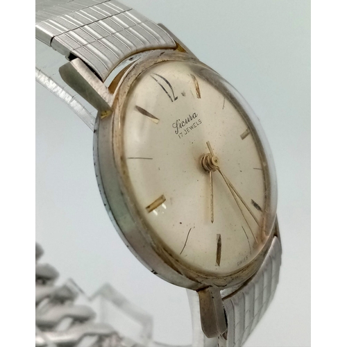 1292 - A Vintage Sicura 17 Jewel Gents Watch. Expandable stainless  steel strap. Case - 32mm. Mechanical mo... 