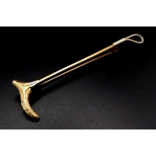 1295 - A Vintage 9K Yellow Gold and Yellow Metal Walking Cane Bar Brooch. 6cm. 3.3g total weight. Boot is h... 