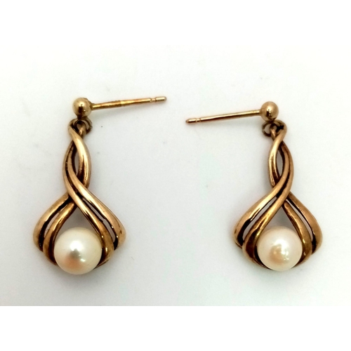 1316 - A Pair of Vintage 9K Yellow Gold and Pearl Earrings. No fasteners. 2.24g