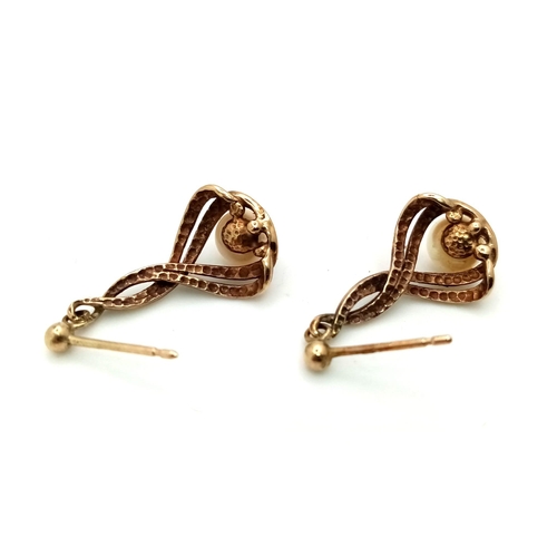 1316 - A Pair of Vintage 9K Yellow Gold and Pearl Earrings. No fasteners. 2.24g