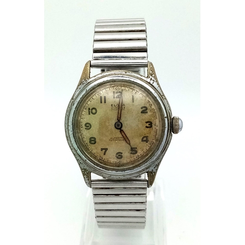 1440 - A Vintage Eloga 17 Jewel Gents Watch. Expandable stainless steel strap. Case - 33mm. Mechanical move... 