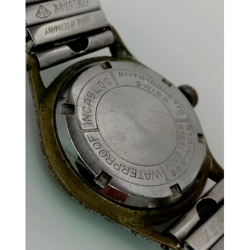 1440 - A Vintage Eloga 17 Jewel Gents Watch. Expandable stainless steel strap. Case - 33mm. Mechanical move... 