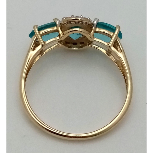 1492 - A 10K Yellow Gold Blue Three-Stone Tourmaline and Diamond Ring. Size R. Total weight - 2.68g.