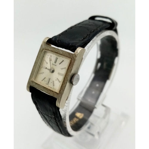 39 - A Vintage Tudor (Rolex) 18K White Gold Cased Ladies Watch. Black leather strap. 18K white gold case ... 