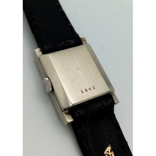 39 - A Vintage Tudor (Rolex) 18K White Gold Cased Ladies Watch. Black leather strap. 18K white gold case ... 