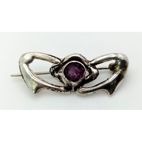 725 - A Very Collectable Charles Horner Sterling Silver and Amethyst Brooch. 3cm