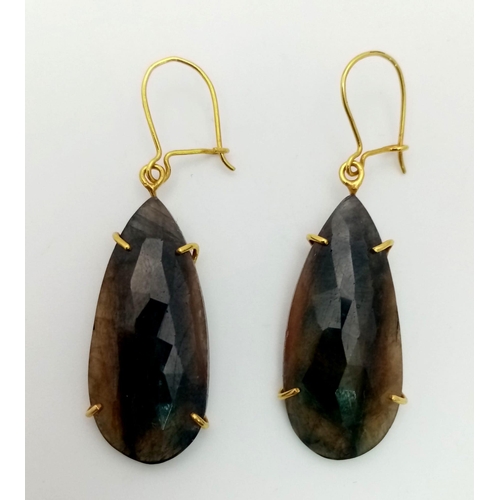 915 - A Pair of 9K Yellow Gold Corundum Teardrop Earrings. 35mm drop. 8g total weight.