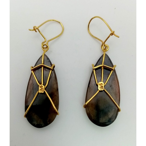 915 - A Pair of 9K Yellow Gold Corundum Teardrop Earrings. 35mm drop. 8g total weight.