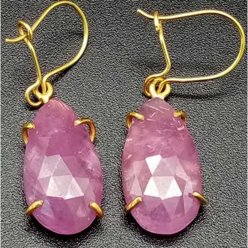 1249 - A Pair of 9K Gold and Ruby Teardrop Earrings. 2.58g total weight.