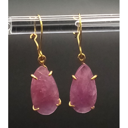 1249 - A Pair of 9K Gold and Ruby Teardrop Earrings. 2.58g total weight.