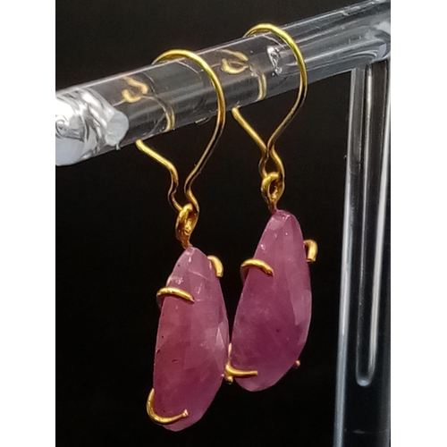 1249 - A Pair of 9K Gold and Ruby Teardrop Earrings. 2.58g total weight.