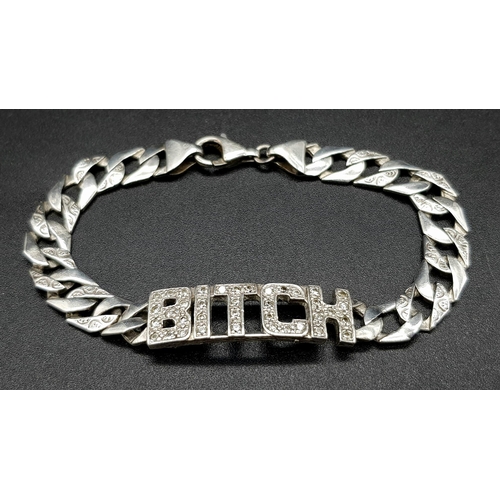 1386 - A 925 Silver Flat Curb Link Bracelet for a Female Dog. White stone decoration. 16cm. 13.75g.