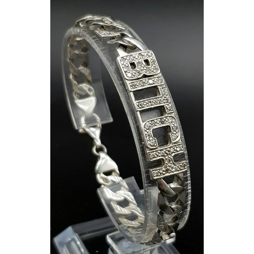 1386 - A 925 Silver Flat Curb Link Bracelet for a Female Dog. White stone decoration. 16cm. 13.75g.