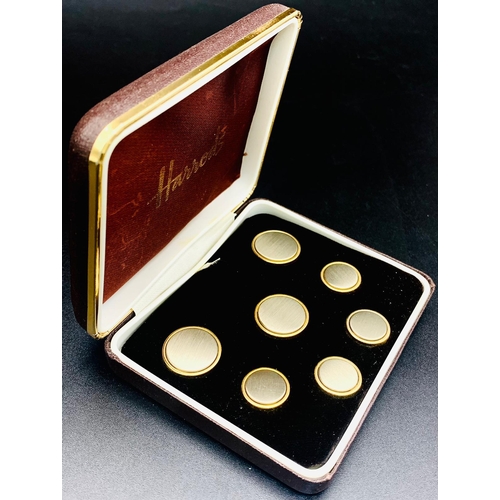 1389 - A Vintage Box of Seven Two-Tone Buttons from Harrods. In a Harrods presentation box.