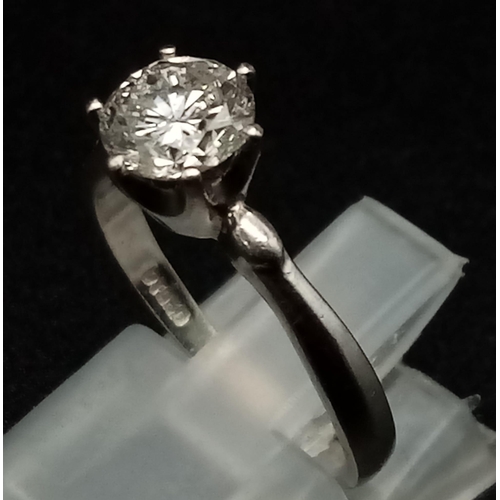 304 - A Platinum and Diamond Solitaire Ring. Excellent quality 0.95ct round cut diamond. Size M. 3.94g tot... 