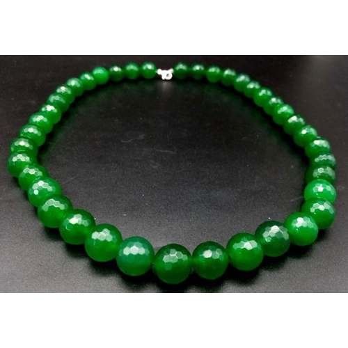 340 - A Large Faceted Jade Beaded Necklace with Silver Clasp. 54cm