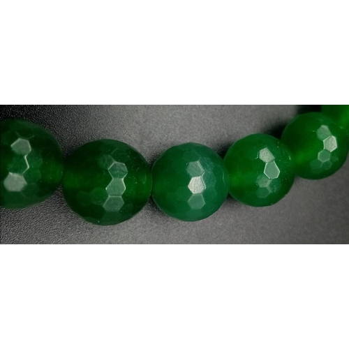 340 - A Large Faceted Jade Beaded Necklace with Silver Clasp. 54cm