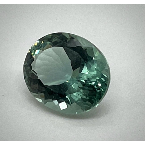 387 - A 16ct Pale Green Gemstone. Oval cut with no visible inclusions. 18 x 14 x 10mm. Heat treated. No ce... 