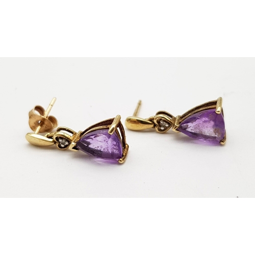 660 - A Pair of Vintage 9K Yellow Gold Amethyst and Diamond Earrings. 1.75g total weight.