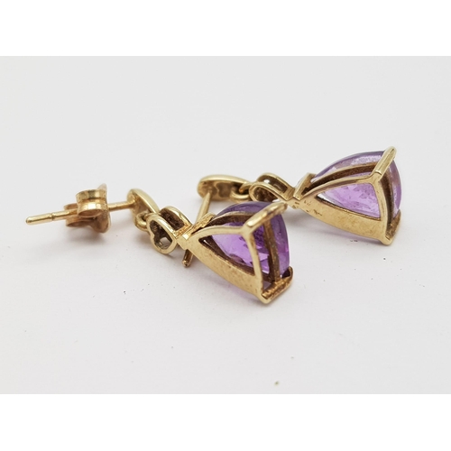 660 - A Pair of Vintage 9K Yellow Gold Amethyst and Diamond Earrings. 1.75g total weight.