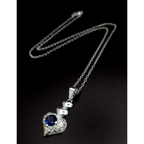 1344 - A 925 Silver Blue and White Stone Heart Pendant on a 925 Silver Disappearing Necklace. 3cm and 44cm