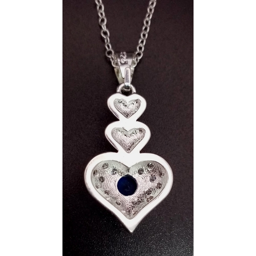 1344 - A 925 Silver Blue and White Stone Heart Pendant on a 925 Silver Disappearing Necklace. 3cm and 44cm