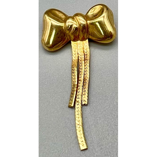 1364 - A 9k Yellow Gold Bow Brooch. Total Weight 1.33grams.