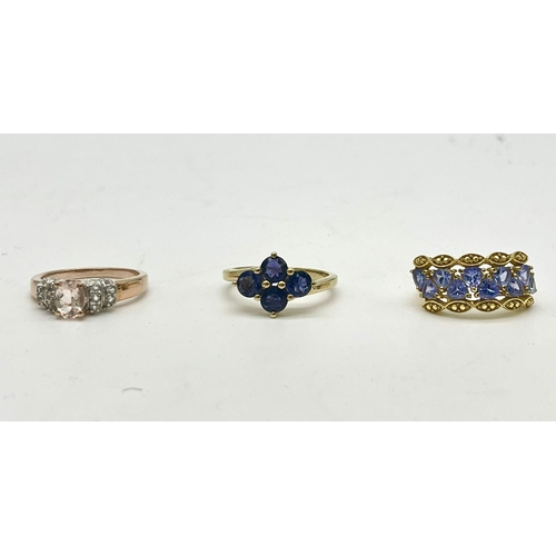 1472 - Three 925 Silver Gilded Gemstone Rings. Amethyst, blue topaz and white quartz. Sizes N, P and R.